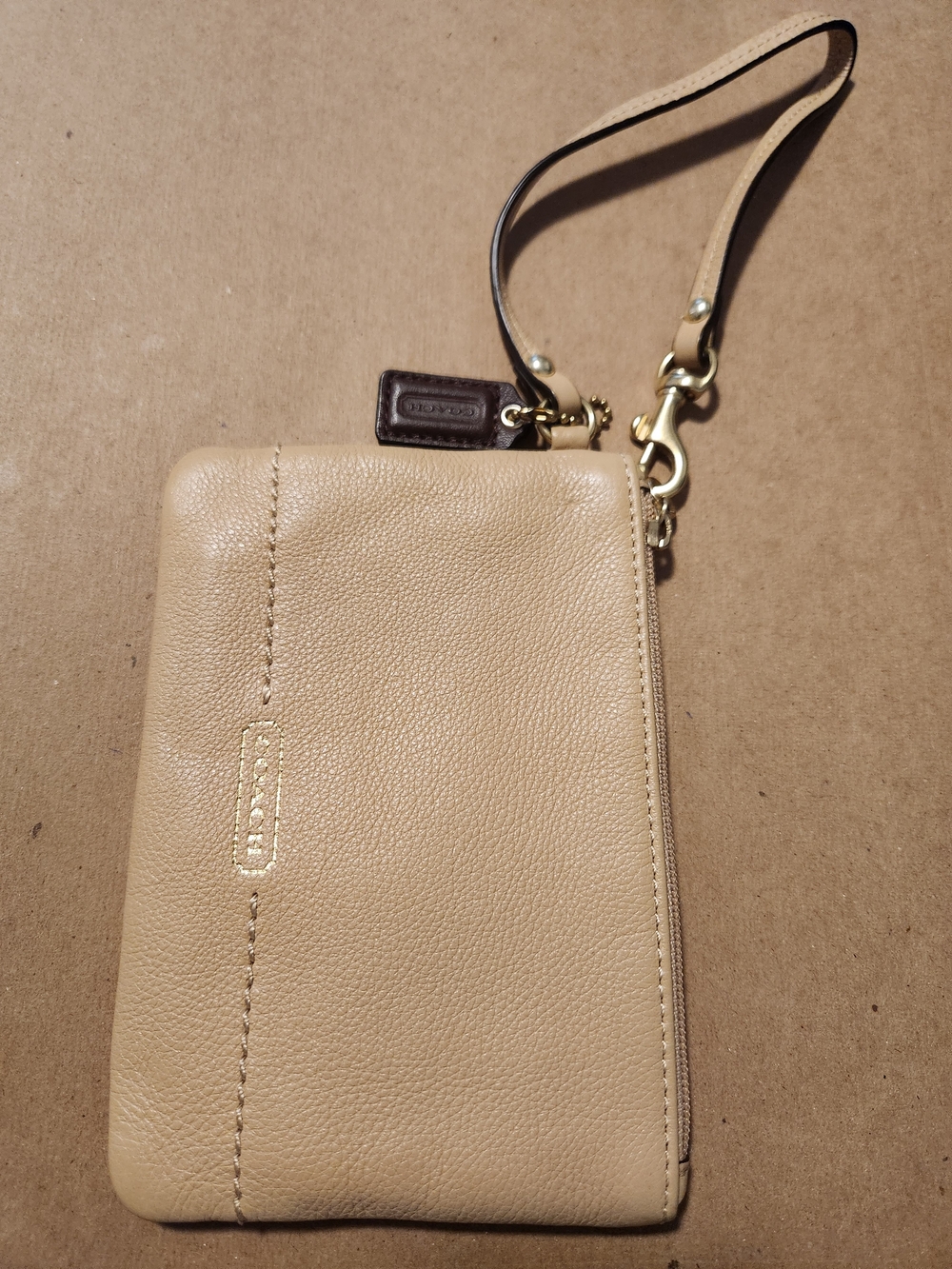 Coach Tan Leather Wristlet with Dark Brown Tag